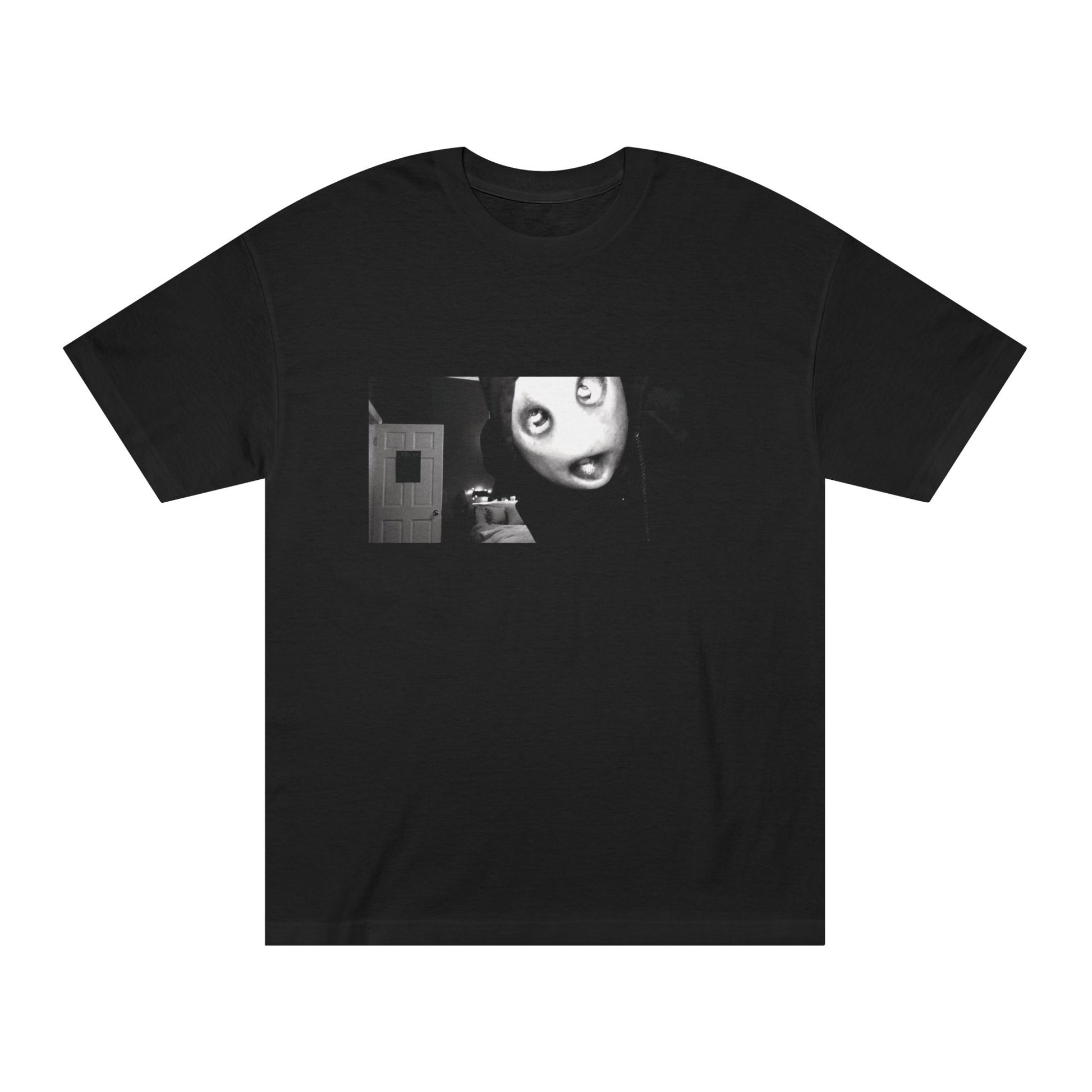 Black t-shirt printed with a black and white film still of the masked Mr. Shiny character, shown flat on a white background