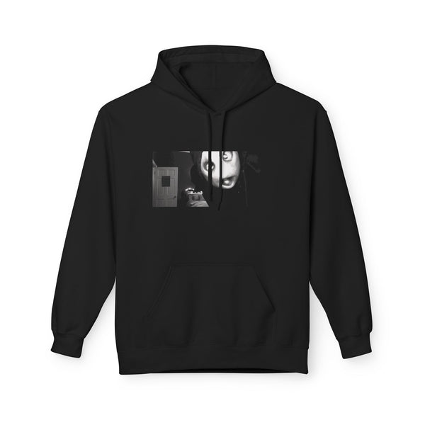 Black hoodie printed with a black and white film still of the masked Mr. Shiny character, shown flat on a white background