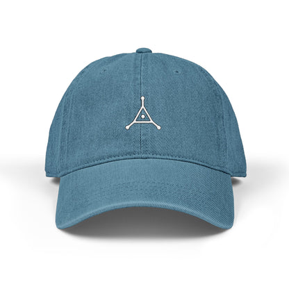 Blue baseball cap with a white logo on a white background